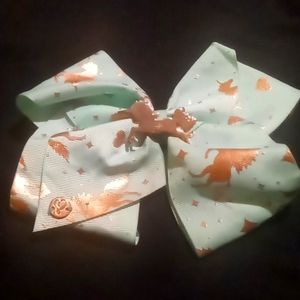 golden and mint unicorn Jojo siwa bow